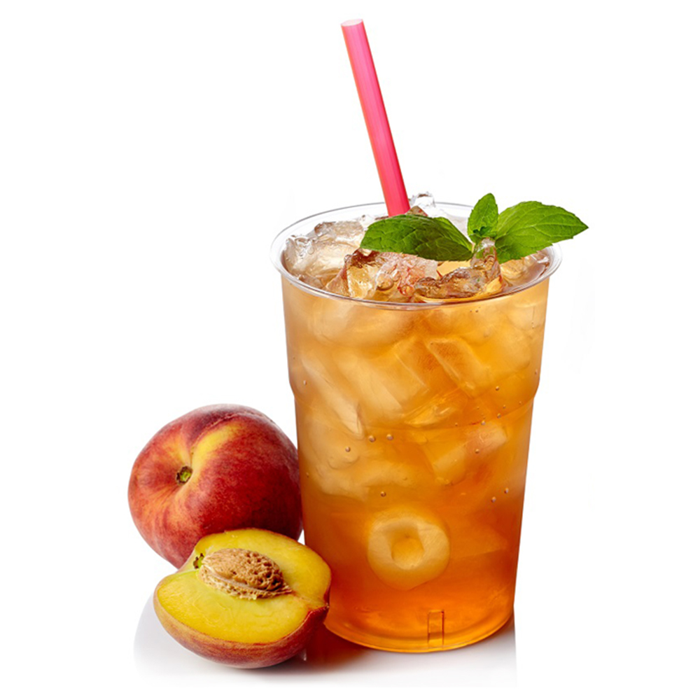 Women's Bean Project Mango Peach ICed tea prepared in a clear glass with lots of ice and a sliced peach