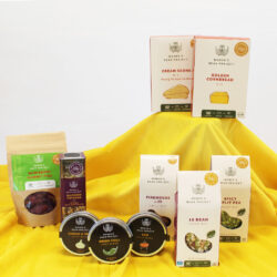 Women's Bean Project sampler box items laid out on a yellow tablecloth