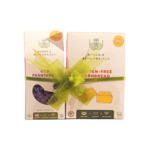 Women's Bean Project gluten-free cornbread and chili set bundle tied with a green bow.