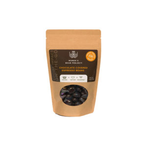 Women's Bean Project chocolate covered espresso beans standing against a white wall