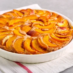 Upside down peach cornbread cake made using Women's Bean Project Cornbread Mix.
