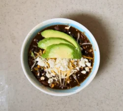 A bowl of Taco Soup using Women's Bean Project Black Bean Soup Mix and Firehouse No 10 Chili Mix